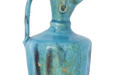 To Be Sold With No Reserve A turquoise blue glazed ewer Central...