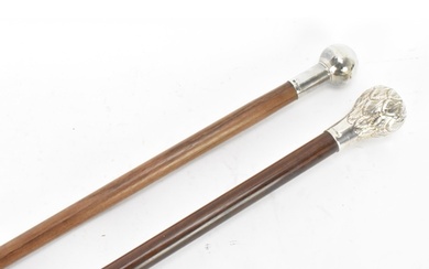 Two mid 20th century silver topped walking sticks, one havin...