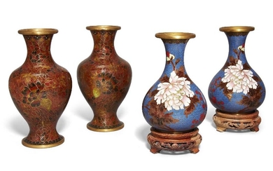 Two pairs of Chinese cloisonné vases, early 20th century, the baluster pair with floral decoration over russet tones, 18.7cm high, the other pair decorated with pink flowering peonies on blue grounds, 15.5cm high, with two carved wood stands (4)...