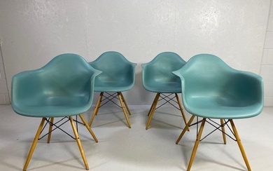 Vitra Eames plastic armchairs, design Charles and Ray Eames,...
