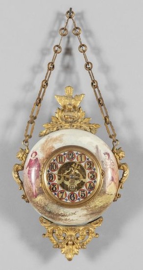 Wall clock in porcelain and bronze decorated with...