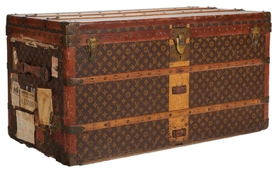 Mail trunk in monogram canvas painted with stencil, three closures, nails and corners in golden brass, main lock numbered 049128, two handles in leather (one rugged), strip painted on the front (missing strap), four casters, beige canvas interior with...