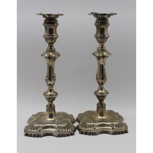 William Hutton Ltd. A pair of Edwardian silver candlesticks ...