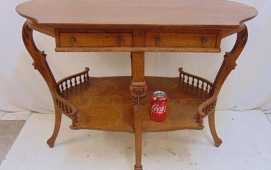 Oak turtle top table, with two drawers and lower shelf