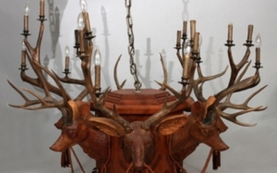 MANSION SIZE CARVED WOOD DEER HEADS AND LEATHER CHANDELIER 41 DIA 56