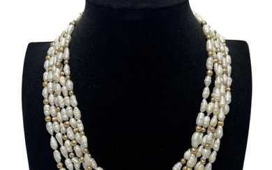 14k Yellow Gold and Freshwater Pearl 3 strand necklace.