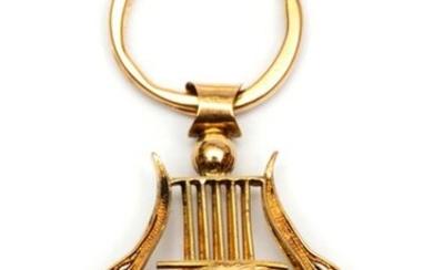 18krt. Golden cachet, 19th century, lyre-shaped, with filigree...