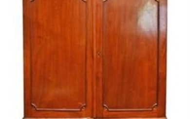 A 19th century mahogany and inlaid wardrobe the cornice with inverted castellated frieze over two cupboard doors, opening...
