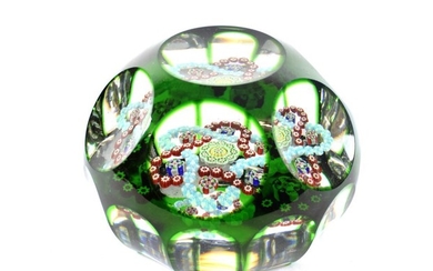 A Baccarat Faceted Translucent Green Overlay Garland Paperweight, circa 1850,...
