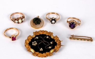 An early Victorian mourning brooch the floral motif set