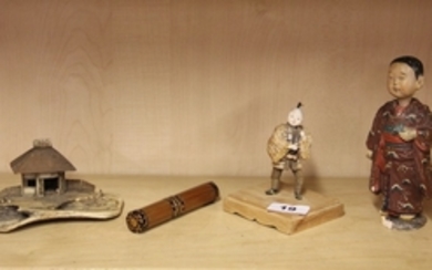 A group of four Japanese items including a nodding Satsuma figure (A/F to base), H. 16cm and a carved bone fisherman's cottage.