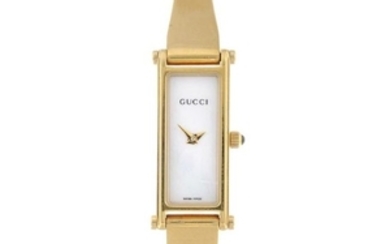 GUCCI - a lady's 1500L bracelet watch. Gold plated