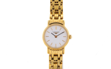 LONGINES - a lady's gold plated Presence bracelet watch. View more details