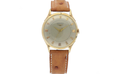 Longines. A Yellow Gold Centre Seconds Wristwatch