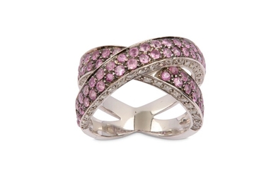 A pink sapphire and diamond crossover ring Of...