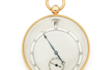 A slim gold key wind open face pocket watch with eccentric jump hour dial