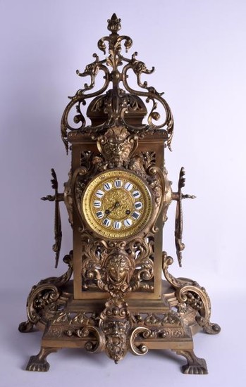 A LARGE 19TH CENTURY FRENCH BRONZE MANTEL CLOCK formed