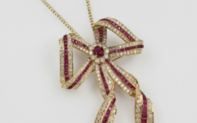 18 kt gold pendant/brooch "bow" with rubies...