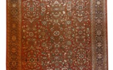 A Mahal carpet, North-West Persia, c.1900, the red ground with a central panel and all-over ...