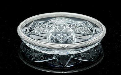 A silver-mounted cut glass bowl