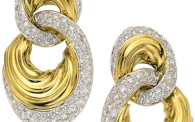 Diamond, Gold Earrings The doorknocker earrings feature full-cut...