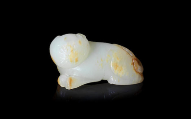 A pale green and russet jade carving of a cat