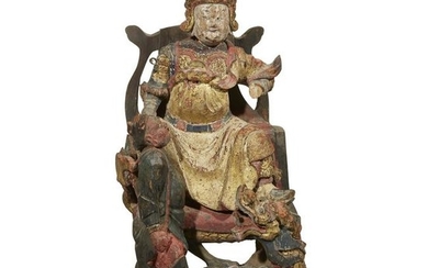 A Chinese carved wood warrior deity