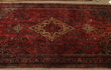 An antique Persian Faraghan Sarouk carpet