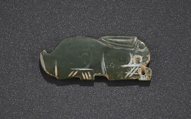 A PALE GREYISH-GREEN JADE RABBIT-FORM PENDANT, LATE SHANG-EARLY WESTERN ZHOU DYNASTY, 11TH-10TH CENTURY BC