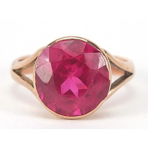 9ct rose gold ruby solitaire ring, the stone approximately 1...