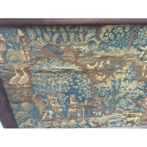 A 17th Century framed tapestry depicting figures in a woodla...