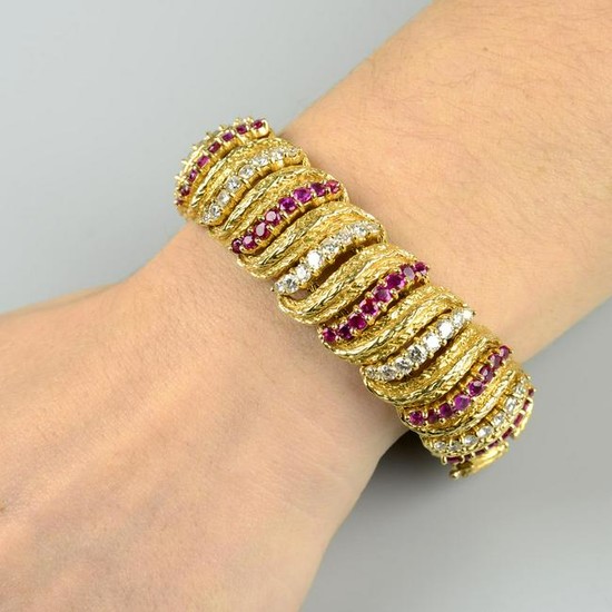 A 1960s 18ct gold ruby and diamond textured bracelet