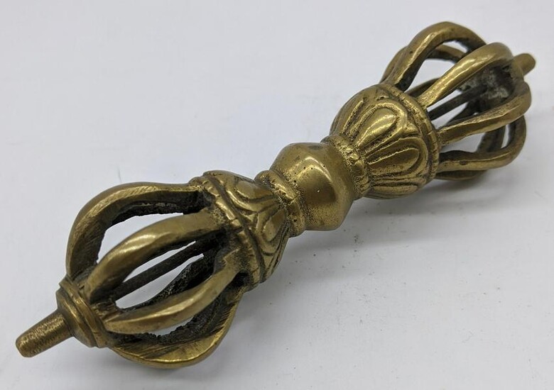 A 19th century Tibetan brass vajra, L.12cm