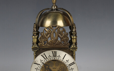 A 20th century brass lantern style mantel timepiece of typical form, the dial inscribed 'An Ell