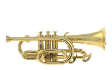 A 9ct gold trumpet brooch.