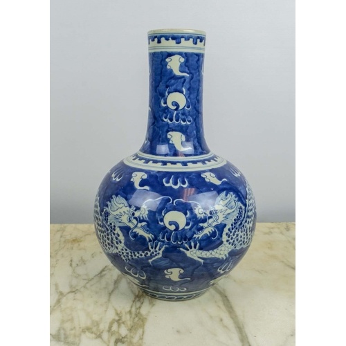 A CHINESE BLUE AND WHITE PORCELAIN BULBOUS VASE, Qing mark t...