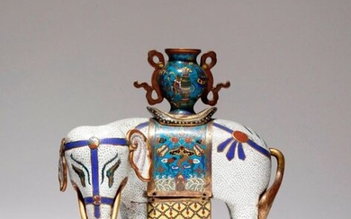 A CHINESE CLOISONNE MODEL OF AN ELEPHANT LATE QING DYNASTY...