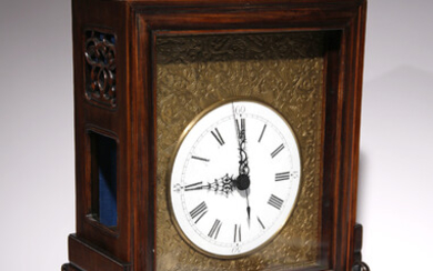 A CHINESE HARDWOOD TABLE CLOCK