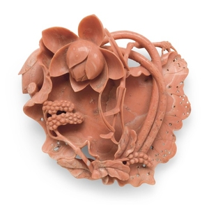 A CORAL ‘LOTUS’ PLAQUE QING DYNASTY, 19TH CENTURY