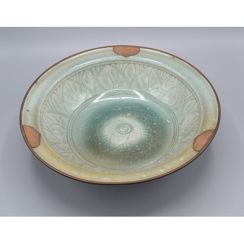 A Chinese Celadon Bowl with metal rim 28 cms diameter