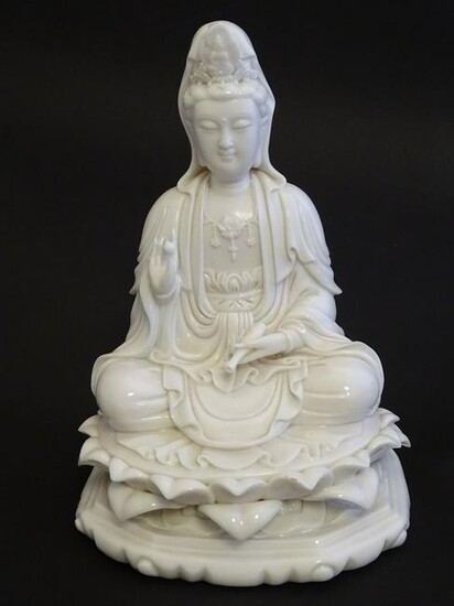 A Chinese blanc de chine figure depicting Guanyin