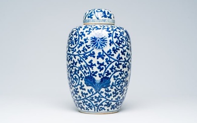 A Chinese blue and white crackle glazed 'lotus scrolls' jar and cover, Kangxi mark, 19th C.