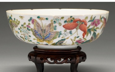 A Chinese famille rose bowl, 20th c, enamelled with butterfl...