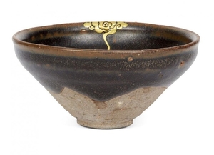 A Chinese grey stoneware black-glazed teabowl, Song...