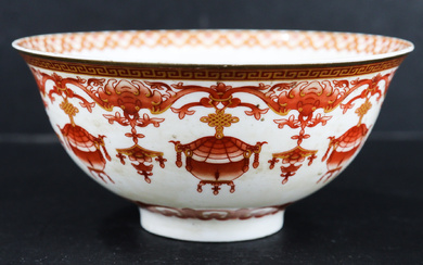 A Chinese porcelain bowl, with iron red decoration of bats...