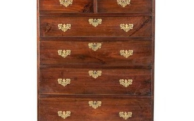 A Chippendale Walnut Shell Carved Flat-Top Chest on
