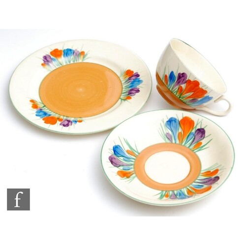 A Clarice Cliff Globe shape tea cup, saucer and side plate c...