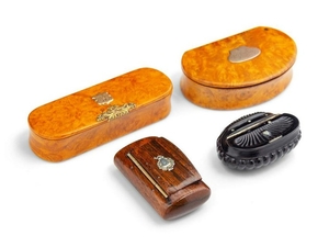 A Collection of Four Continental Carved Wood Snuff Boxes