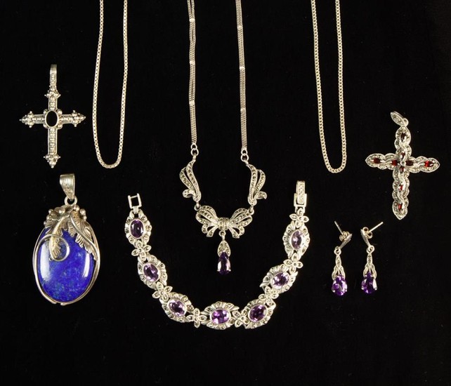 A Collection of Silver Jewellery: Two pendant crucifixes; one set with nine marquise garnets on a ma