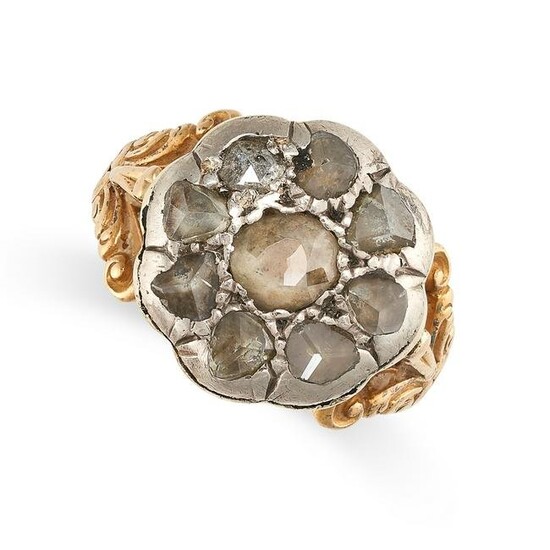 A DIAMOND CLUSTER RING in high carat yellow gold and